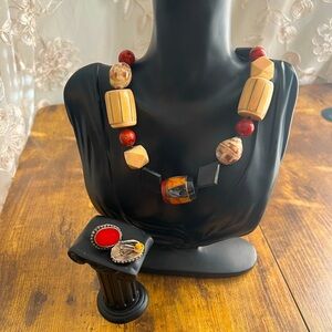 Multicolored symmetrical necklace with matching earrings.